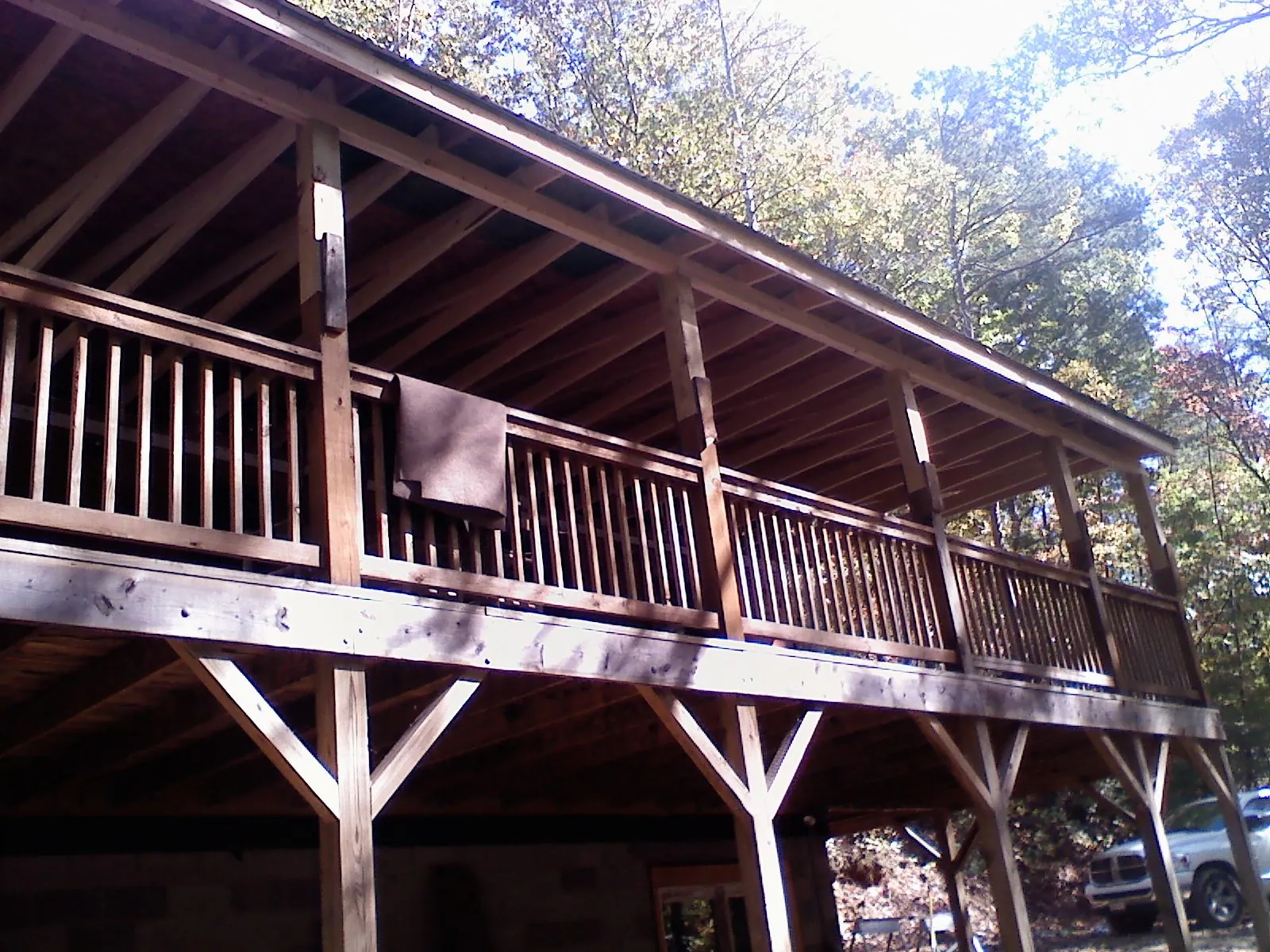 Timber framing under a new elevated porch and deck — Roof Leak Repair in American Fork by Roofing Brothers